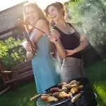Two girls on grill